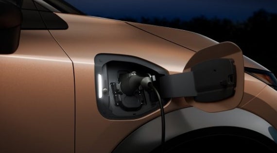Close-up image of charging cable plugged in | Andy Mohr Nissan in Indianapolis IN