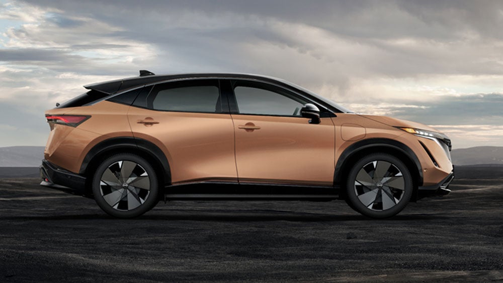Nissan ARIYA in Sunrise Copper in dramatic landscape | Andy Mohr Nissan in Indianapolis IN