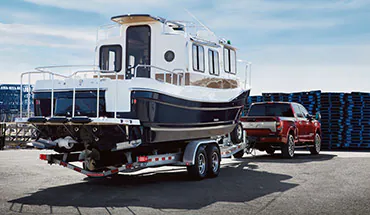 2022 Nissan TITAN Truck towing boat | Andy Mohr Nissan in Indianapolis IN
