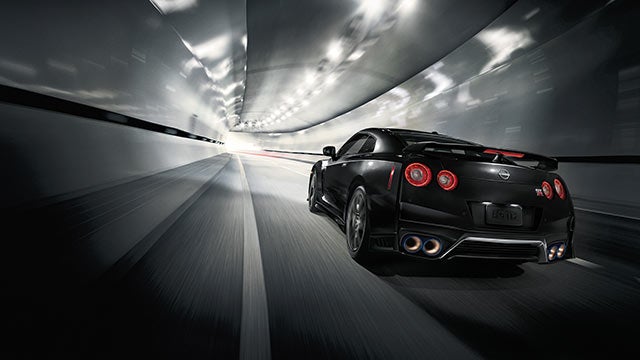 2023 Nissan GT-R seen from behind driving through a tunnel | Andy Mohr Nissan in Indianapolis IN